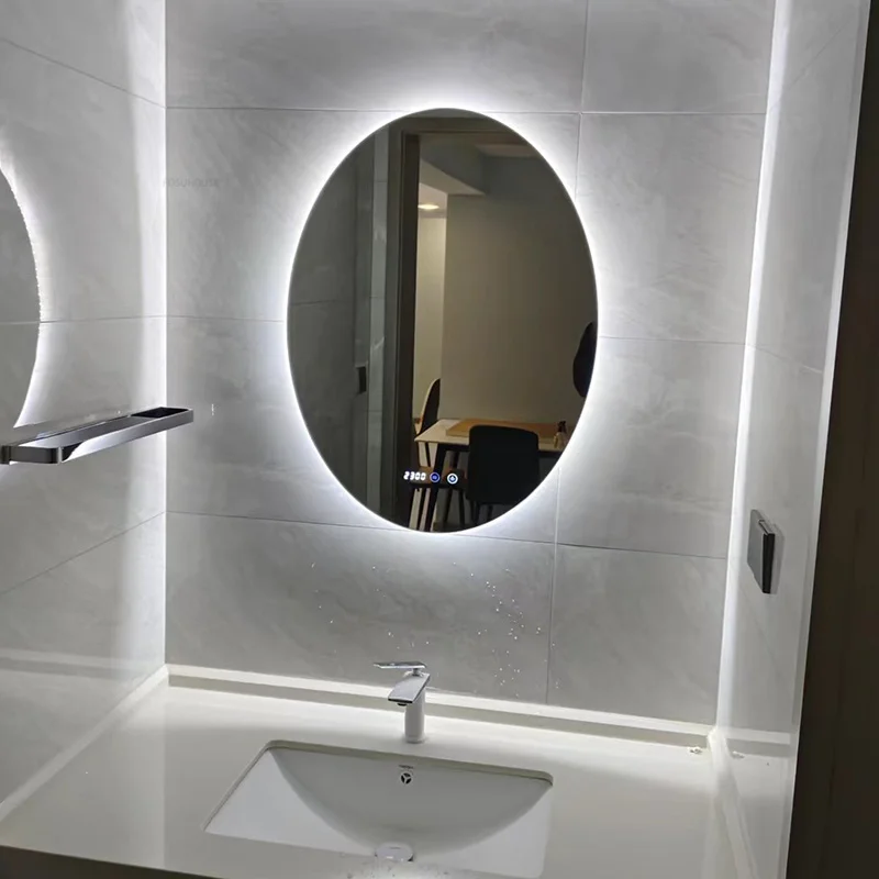 Espejos de baño ovalados inteligentes modernos para el hogar, espejos de baño antivaho minimalistas para colgar en la pared, Espejos de maquillaje con pantalla táctil de luz LED